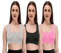 Pack of 3 women wearing Enamor low-impact cotton sports bras.